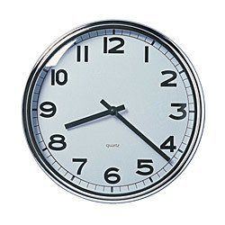 sleek modern wall clock with bold numbers, brushed steel frame, and practical design for any space.