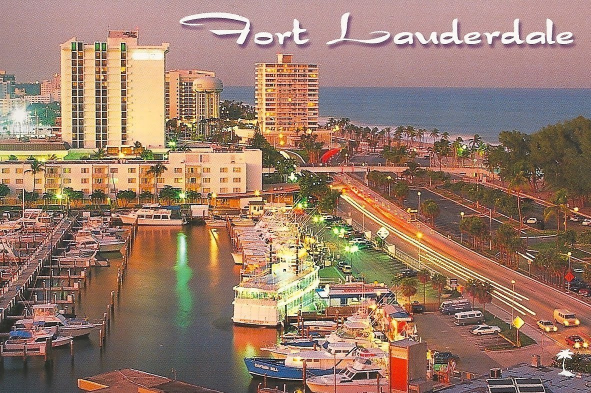 fort lauderdales marina at dusk: vibrant boats, glowing skyline, and tropical coastal beauty.