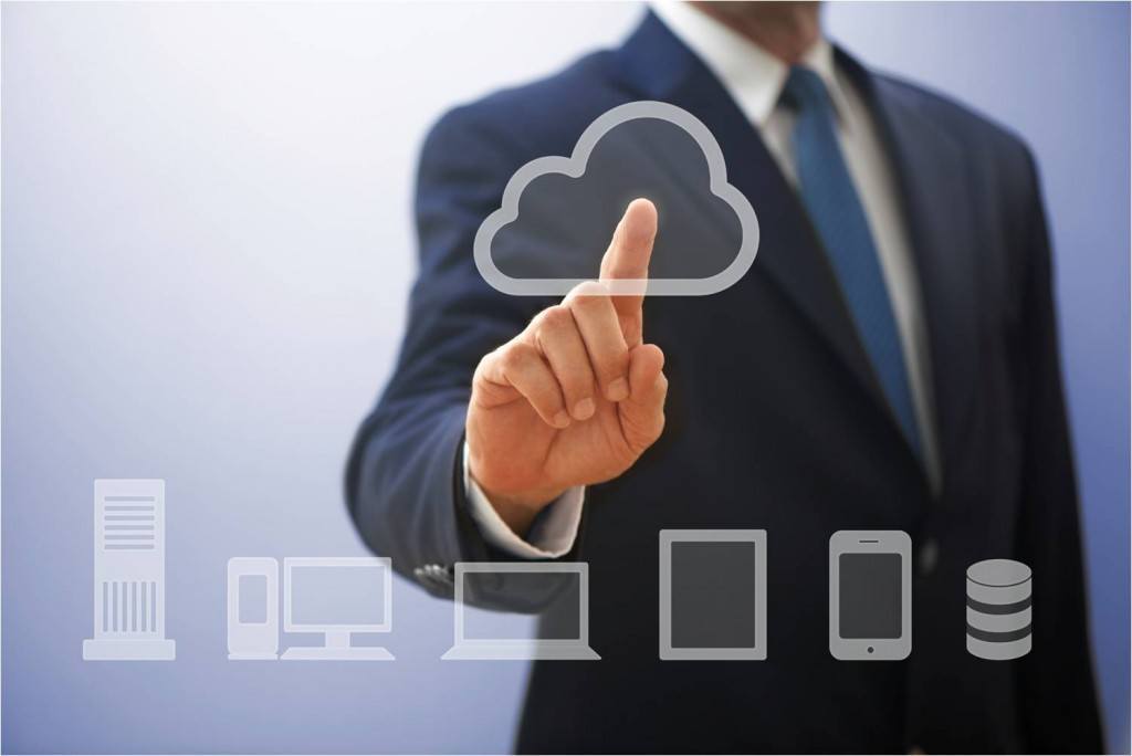 business professional engaging with cloud technology and digital devices for enhanced productivity.