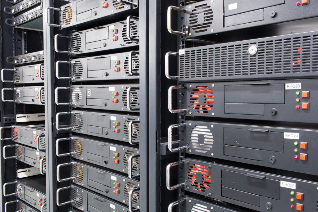 a row of servers in a server room