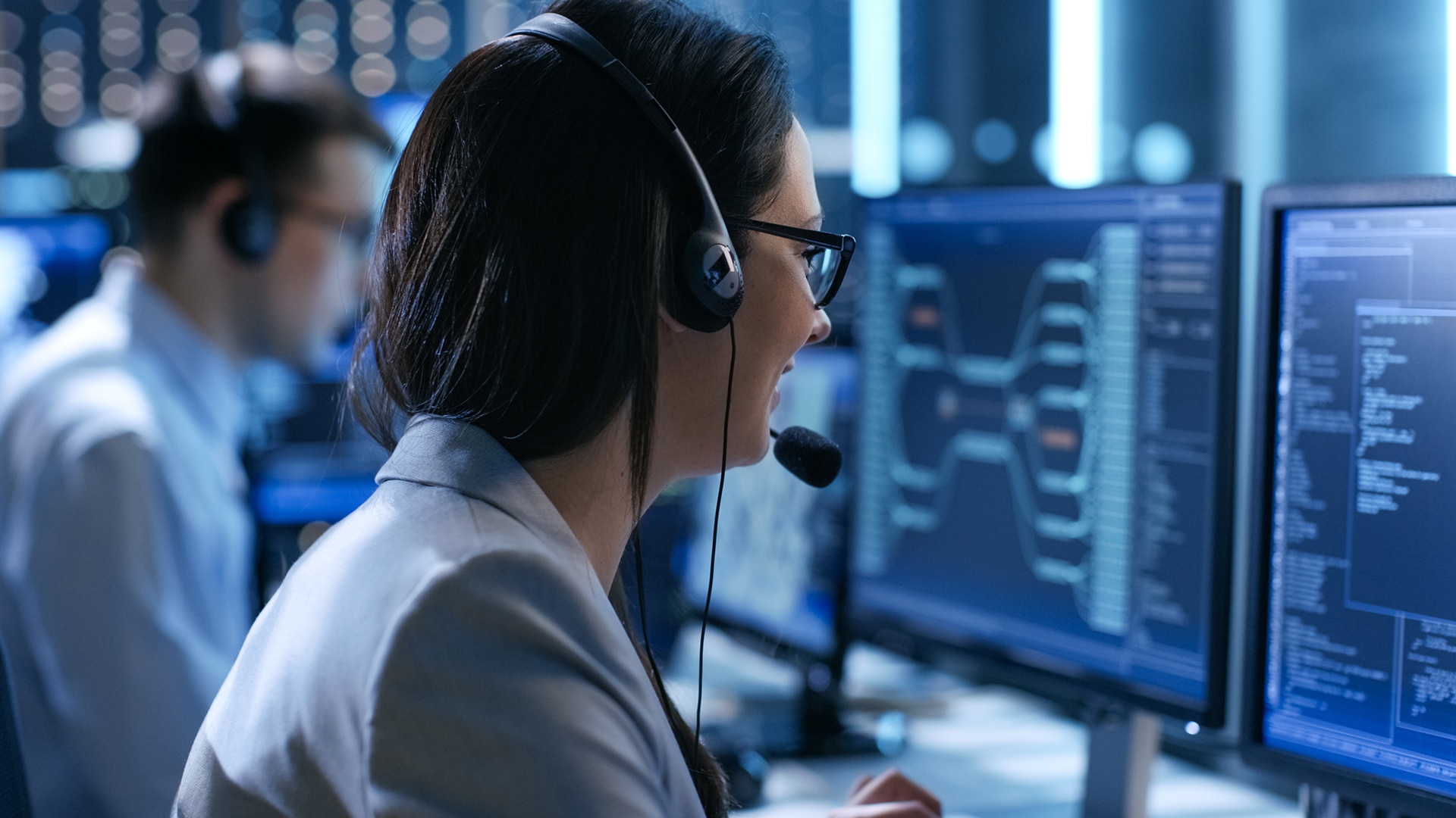 a woman wearing a headset in a call center